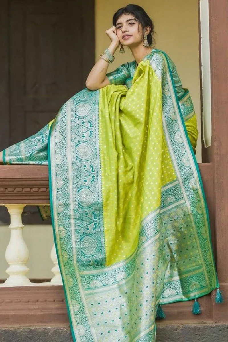 Enticing Parrot Soft Silk Saree With Blooming Blouse Piece
