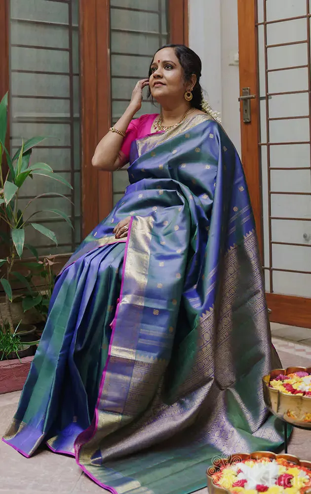 Peacock blue vairaoosi saree with mayil chakaram buttas
